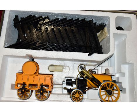 A BOXED HORNBY RAILWAYS 3   GAUGE STEPHENSONS ROCKET LIVE STEAM TRAIN SET, No.G100, not tested, appears largely complete and 