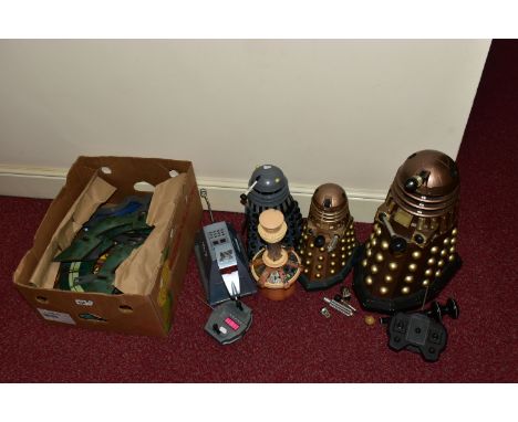 A BATTERY OPERATED REMOTE CONTROL K-9 FROM DOCTOR WHO, with two battery operated Daleks, not tested, only K-9 and one of the 