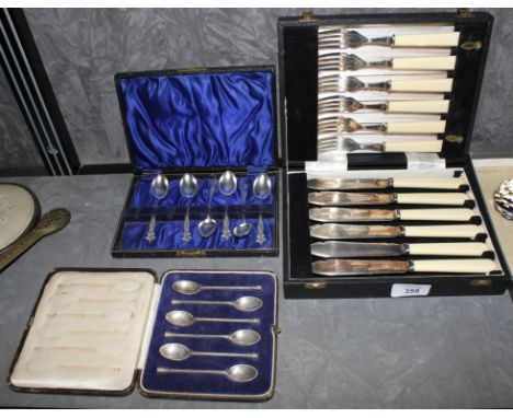 A set of six Sheffield silver seal spoons in presentation case, six Birmingham silver teaspoons in presentation case, a Josep