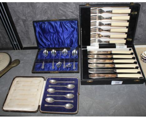 A set of six Sheffield silver seal spoons in presentation case, six Birmingham silver teaspoons in presentation case, a Josep