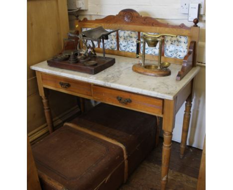 A late Victorian marble top wash stand with carved, etched and tile- fronted gallery, two drawers under with brass drop handl