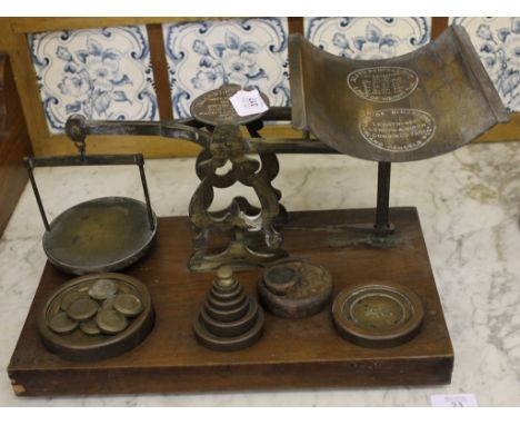 An antique Inland Letters Post and Parcel weighing scales by S. Mordan and Co, London with brass weights and fittings on an o