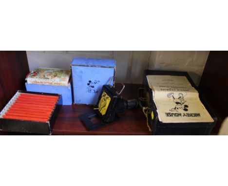 An Ensign Mickey Mouse Magic Lantern with twenty-two slides and accompanying story-guide in original box 