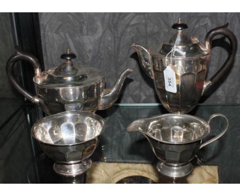 An early 20th century Sheffield silver plated four-piece tea and coffee service, comprising tea pot, coffee pot, sugar bowl a