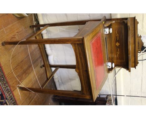 An Edwardian rosewood bureau with all over inlay, serpentine fronted shelf to the upper structure, twin porcelain ink bottles