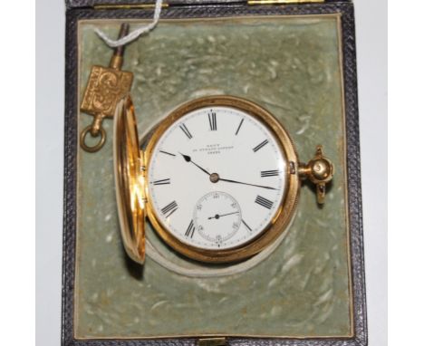 A gentleman's 18 carat gold key-wind pocket watch in full hunter form, white enamel dial, Roman numerals by Dent in original 