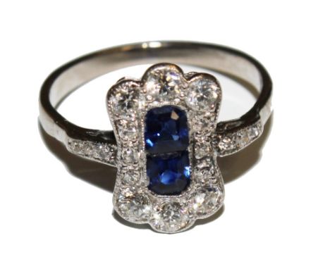 An Art Deco 18 carat white gold sapphire and diamond ring
