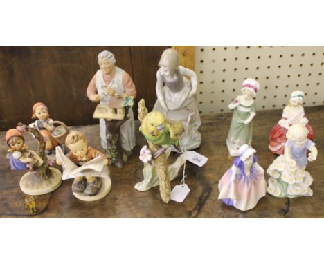 A selection of five small Royal Doulton figurines of young girls and a Lladro figurine of a woman with cat and four Goebel fi