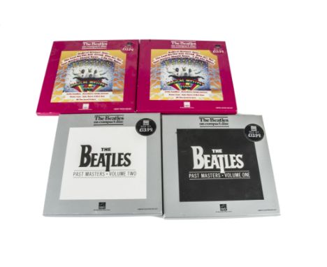 Beatles CD Box Sets, four CD Box Sets comprising Past Masters Volumes One and Two (Both with Badge and Book) and Magical Myst