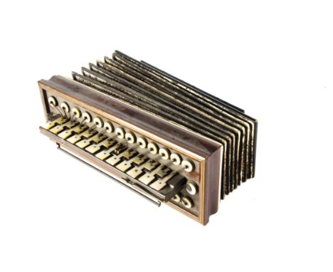 Flutina, a mid-19th Century early accordion/melodeon by Buisson, Paris, with mother of pearl keys, in rosewood casing, A/F 
