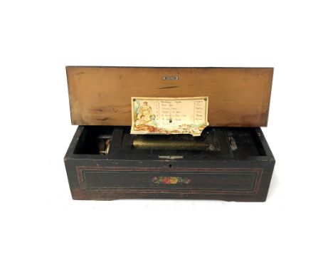 Unrestored Swiss 8 tune, 50-note cylinder music box with original tune sheet. A few of the teeth are broken. Case has been da