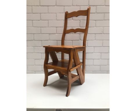 A nicely restored vintage stair chair. These chairs which could be used both as a chair and folded open as a ladder could be 