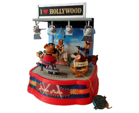 1993 Enesco "Home on the Stage" deluxe multi-action battery powered music box. Plays the tune "You oughta be in pictures". "L