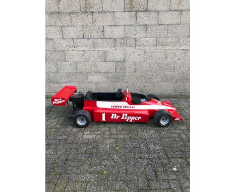 Formula 1 shaped go-kart with Dr. Pepper branding in very good, working condition. Tecumseh engine, Goodyear tires.    Height