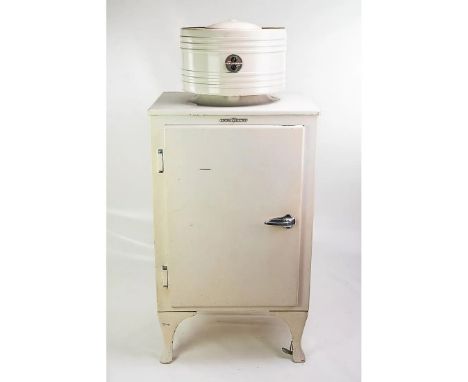 Vintage original ca. 1930s General Electronics refrigerator often called a "Monitor Top" because the top-mounted compressor r