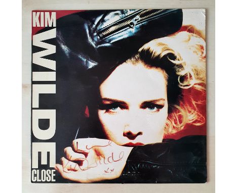 Kim Wilde 12" vinyl record "Close" with signature. "Close" reached the Top 10 in the UK, almost all Scandinavian countries, A