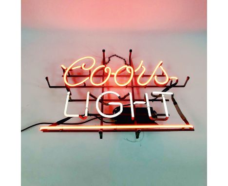 Original Coors Light neon sign from around 1980's. Very good working condition with two color neon lights. Height: 50 cm. Wid