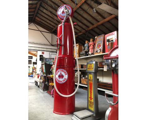 Early Gilbert &amp; Barker gas pump with older restoration done in Red Crown gasoline motif. Painted red inside and out with 