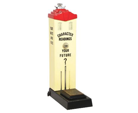 Penny fortune scale from the American Scale Manufacturing Company with red porcelain top, painted tin signs, and cast-iron ba