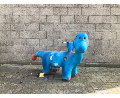 Coin-operated children's fairground dinosaur attraction. The dinosaur features a coin slot, 4 wheels, 2 LED light panels and 