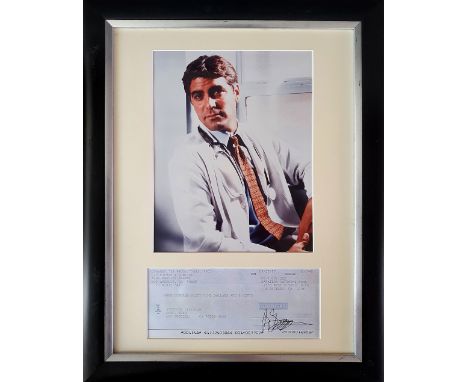 A picture of George Clooney from the TV series "ER" (Dr. Doug Ross) with a paycheck and original signature on it. The picture