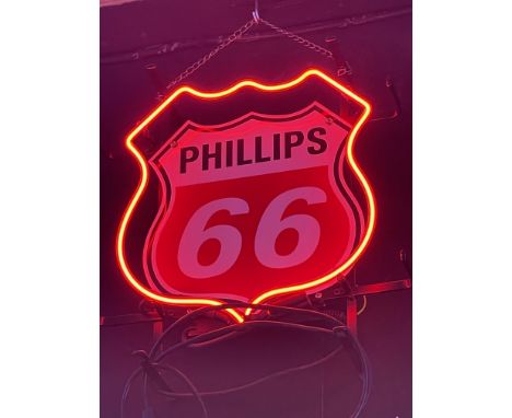 Philips 66 neon sign with enamel backplate. that looks great both turned on or off. Height: 30 cm. Width: 25 cm. Condition: V