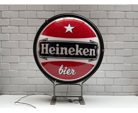 Large double-sided Heineken Bier light up sign in working condition.    Height: 100 cm. Width: 85 cm. Depth: 27 cm. Condition