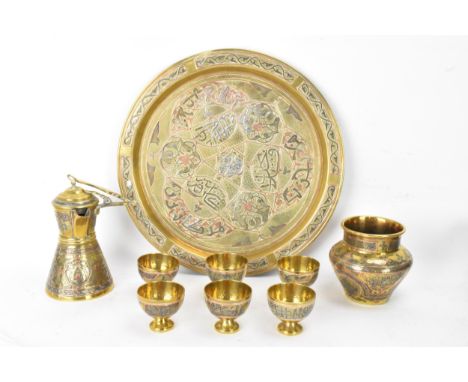 A 19th century Islamic Cairoware mamluk revival brass coffee/tea service, consisting of a tray 31.5cm diameter, dallah pot 15