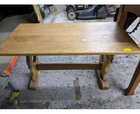 A small light oak coffee table on trestle ends, 46 x 90 x 47, Location: 