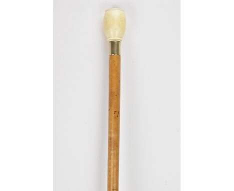 A late 19th/early 20th century walking stick, with an ivory knop handle inset with a compass, nickel silver bound collar and 