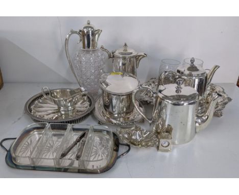 Silver plated items to include two teapots, a claret jug, a coffee pot, tray, miniature clock and other itemsLocation:If ther