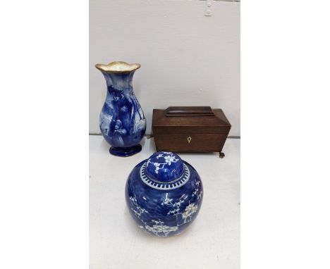 An early 19th c mahogany tea caddy, a Royal Doulton blue children series vase and a Chinese ginger jarLocation:If there is no