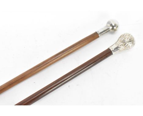 Two mid 20th century silver topped walking sticks, one having a ball knopped finial, hallmarked Birmingham 1967, 96.5cm, the 