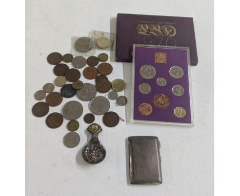A mixed lot to include an engine turned cigarette case, 64.8g, mixed British coinage and a tea caddy spoonLocation:If there i
