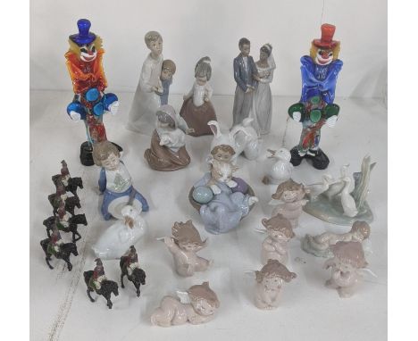 A collection of Lladro and Nao figurines to include six Nao cheeky cherubs, Lladro 4874 boy and girl together with two Murano