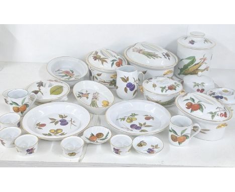 A collection of Royal Worcester Evesham pattern to include tureens, a biscuit jar, ramekins, dishes and othersLocation:If the
