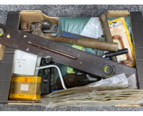 Box of miscellaneous vintage hand tools including hammer, level, wrench &amp; plane