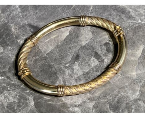 Ladies 9ct gold bangle with rope design, 10.2g