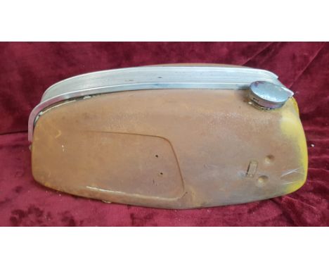 A Triumph Trident petrol tank.