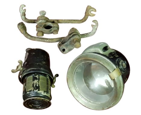 A King of the Road acetylene motorcycle lamp, with separate carbide container and a pair of brackets.