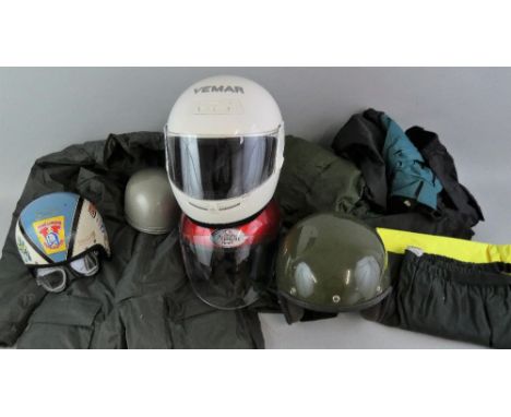 Various motorcycle wet weather gear, a Stadium Project K helmet with 1970's stickers, an Everoak "pudding basin" helmet and t