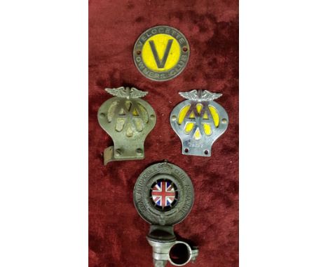 A Royal Automobile Club chrome and enamel motorcycle badge, number E43410, a Velocette owner’s club badge and two AA motorcyc