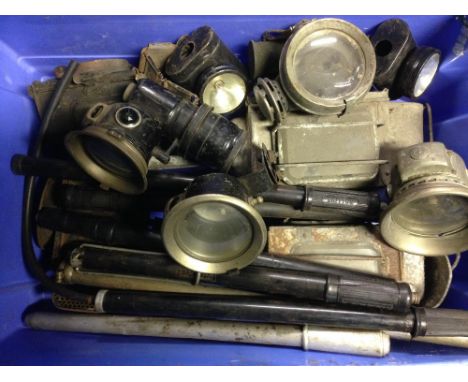 A King of the Road bicycle acetylene lamp, other lamps and various hand pumps.