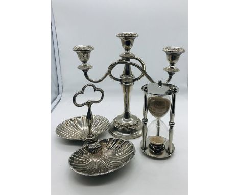 Three silver-plated items to include a bonbon dish, candlestick and a large sand timer., 