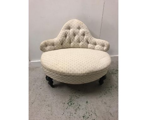 A Small Serpentine settee with Serpentine style button back.