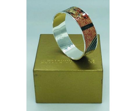A Metropolitan Museum of Art Klimt Textile pattern bangle in original box.