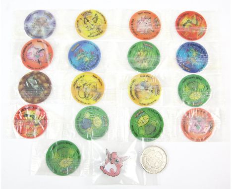 Pokemon Bundle. Includes one Pikachu metal coin from 2000, one enamel wigglytuff pin and 17 Sealed Tazos. Some popular pokemo