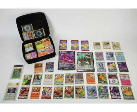 Pokemon TCG: Pokemon Card Bundle. Includes 2 Graded Cards, Two Jumbo Cards, Three Pokemon Match Battle Booster Packs and appr