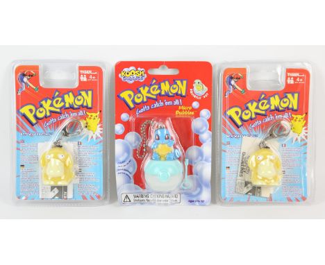 Pokemon Assorted keychain and bubble blowing toy lot. Two Light up Psyduck key chains by Tiger. One Koosh Squirtle Micro Bubb