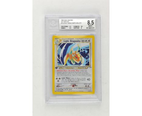 Pokemon TCG. Neo Destiny 1st Edition Light Dragonite Holo 14/105 graded Beckett 8.5. Condition Report:  Graded Beckett 8.5. 